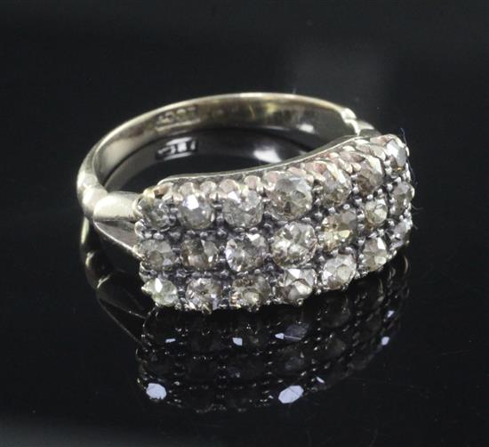 An 18ct gold triple row diamond ring,	 size O.